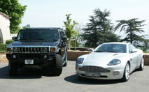 Essai Passion/ Aston Martin Vanquish vs Hummer H2 : duel aux antipodes