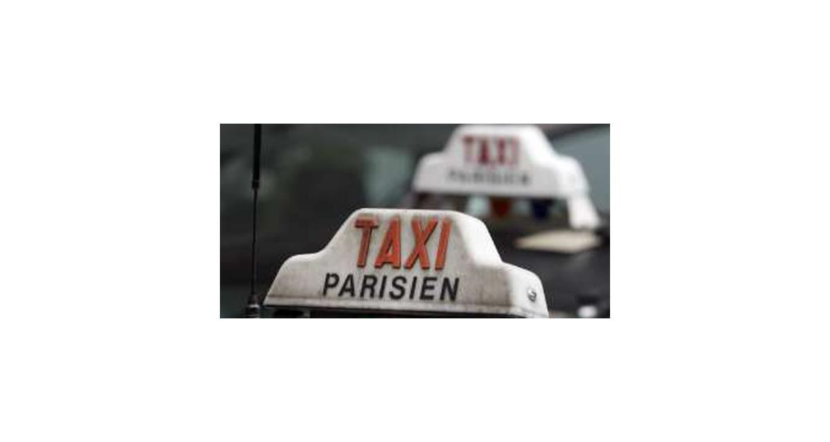 Les taxis parisiens passent au feu rouge 